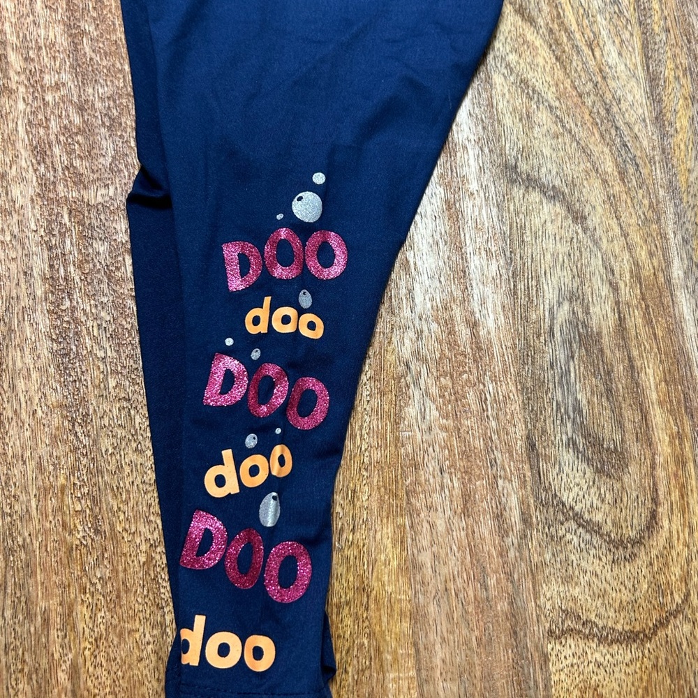 Blue and Red Leggings with Colorful Text Pattern